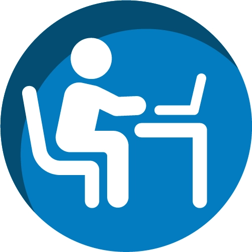Icon of a person sitting at a desk and using a laptop